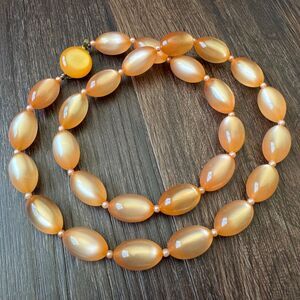Genuine Lucite Peach Glow Necklace Beaded Orange Oval 24 inch Vintage Jewelry
